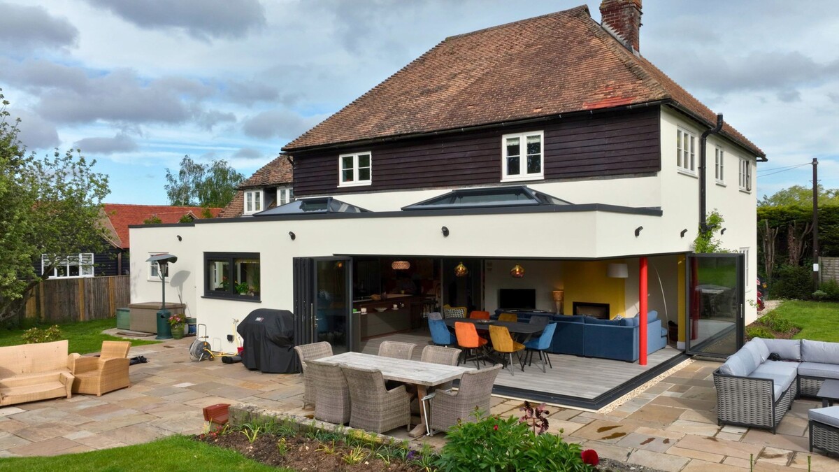 From a restrictive lean-to to a modern corner-less extension that maximises natural light and strengthens the connection to the garden.
