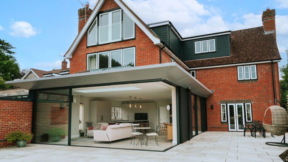 From traditional conservatory to a striking, modern extension designed for light, flow and connection