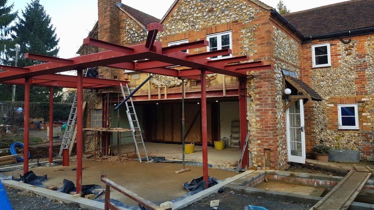From structural framework to a finished copper-roof extension, opening the home to garden and natural light